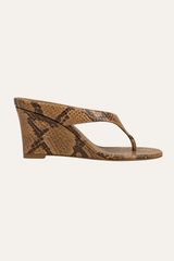 Benita high wedge thong sandal in sand python-print leather, side view