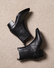 Luxury black leather ankle boots – Italian-made with structured block heel and refined silhouette