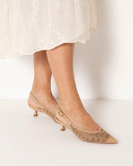 Bianca Buccheri Lauren camel suede slingbacks on foot, rear three-quarter view showing the slingback strap