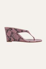 Benita high wedge thong sandal in pink python-print leather, side view