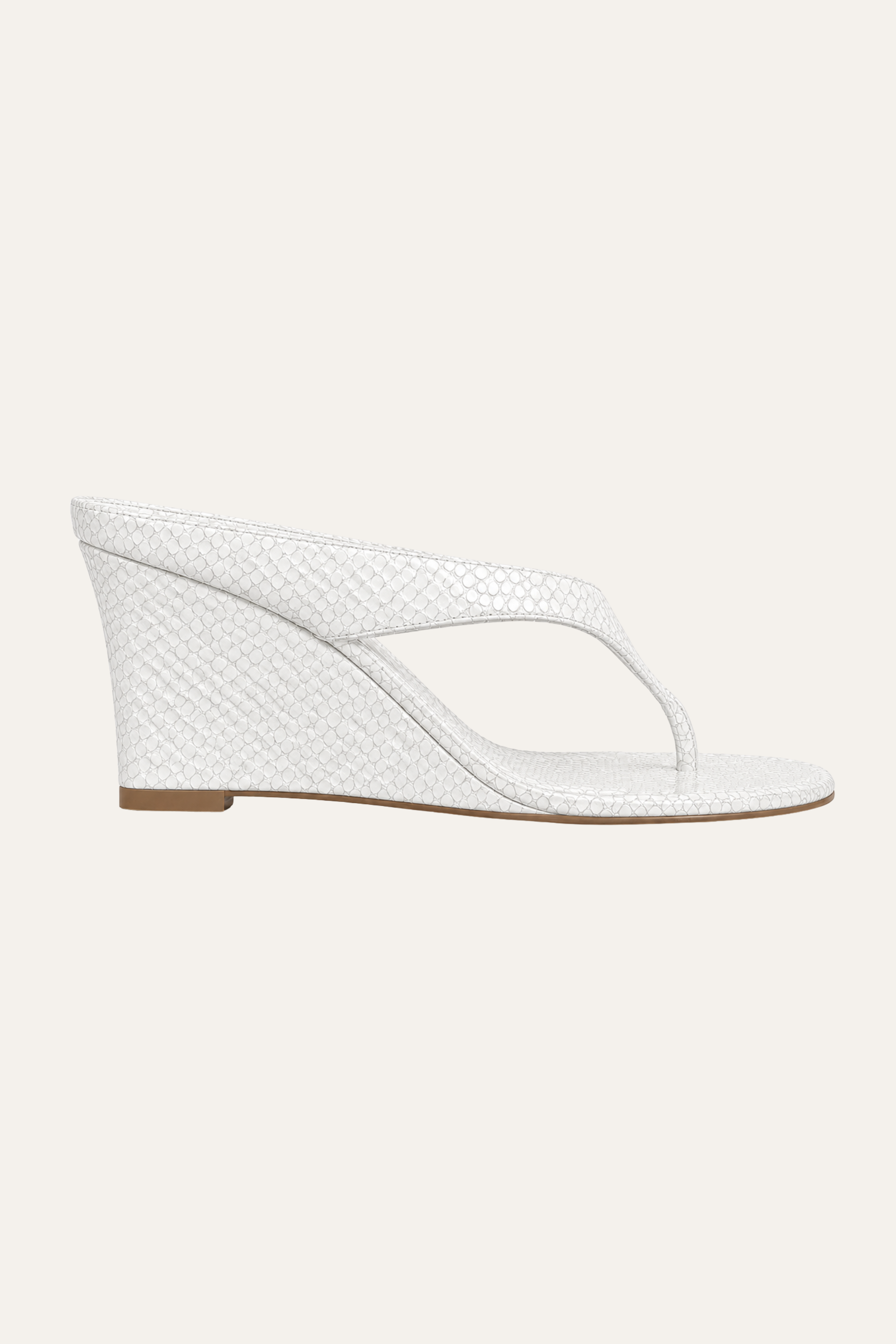 Benita high wedge thong sandal in white snake-embossed leather, side view