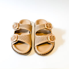 Dolci Firme Beaty nude slide sandals with gold ring buckles, top-down pair