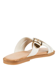 Dolci Firme Lilla milk leather slide, three-quarter rear view showing the contoured tan leather footbed