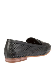 Dolci Firme Keah black woven leather penny loafer, three-quarter rear view on a natural stacked sole