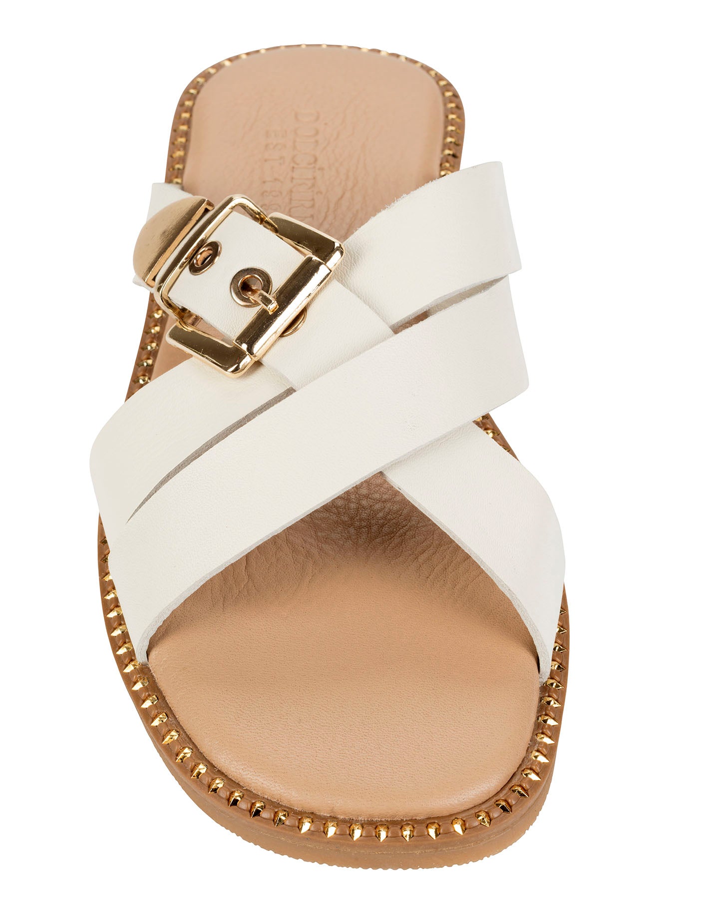 Dolci Firme Lilla milk leather slide, top view showing the crossover straps, gold squared buckle and studded sole edge
