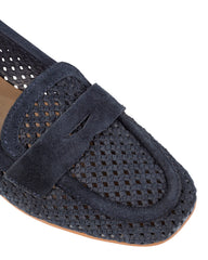 Close-up of the woven suede upper and penny keeper on the Dolci Firme Keah navy loafer