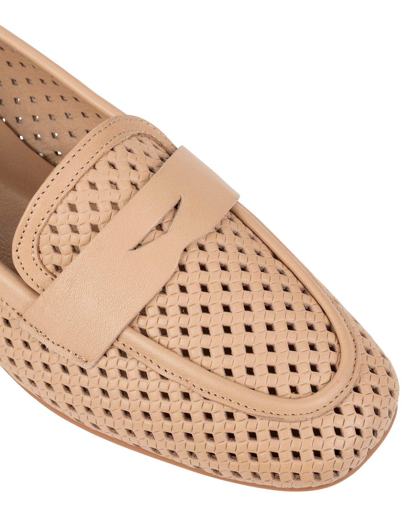 Close-up of the woven leather upper and leather penny keeper on the Dolci Firme Keah nude loafer
