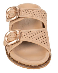 A single women's slide sandal from the brand Dolci Firme , shown from a top-down view. The sandal features two wide straps with a textured, perforated pattern and large, round rose gold-tone metal buckles.